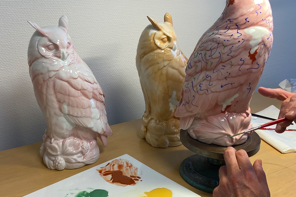three harald awards in different stages of being painted